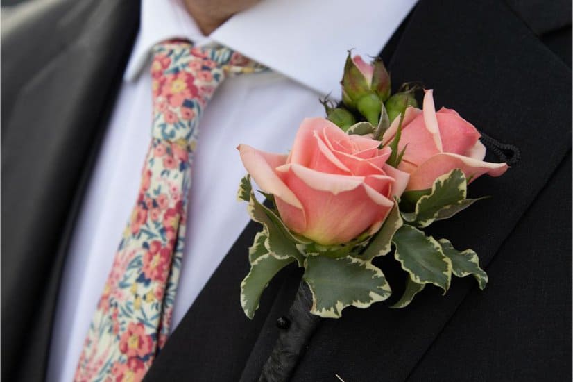 man wearing floral necktie