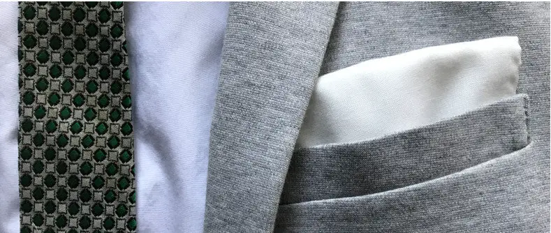 marble gray blazer, white shirt, and white pocket square