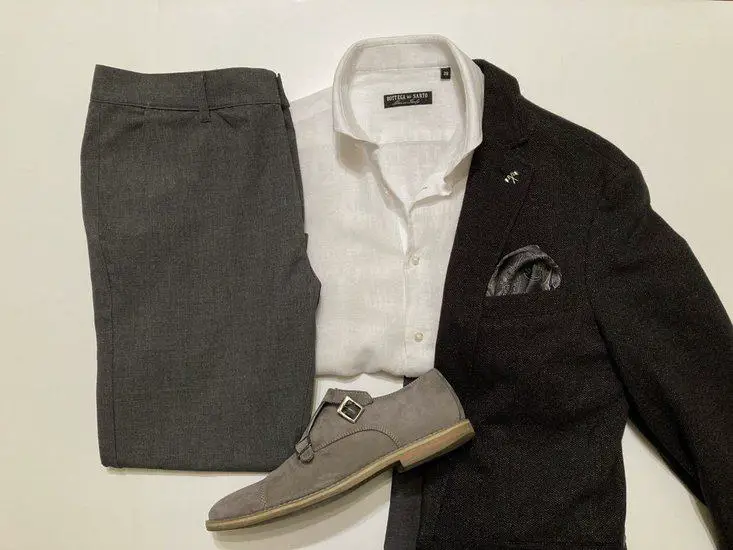 Black blazer and gray pants 