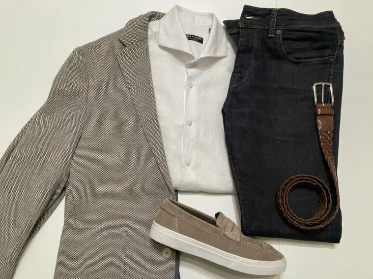 Tan blazer, white button-up shirt, dark wash denim jeans, brown leather loafers