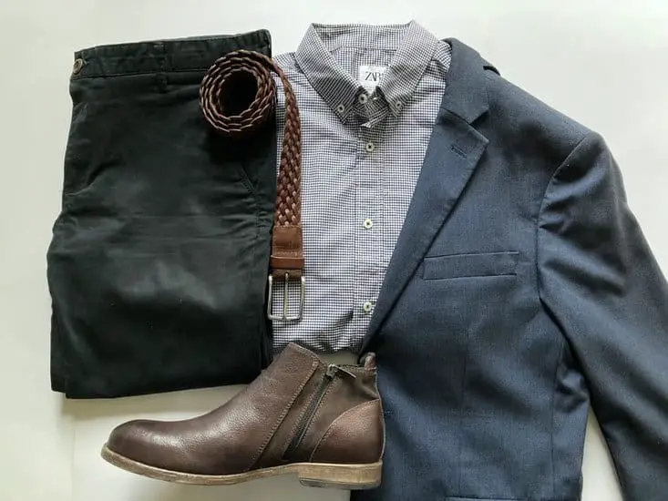 blue blazer with black jeans, gingham shirt and tan leather desert boots