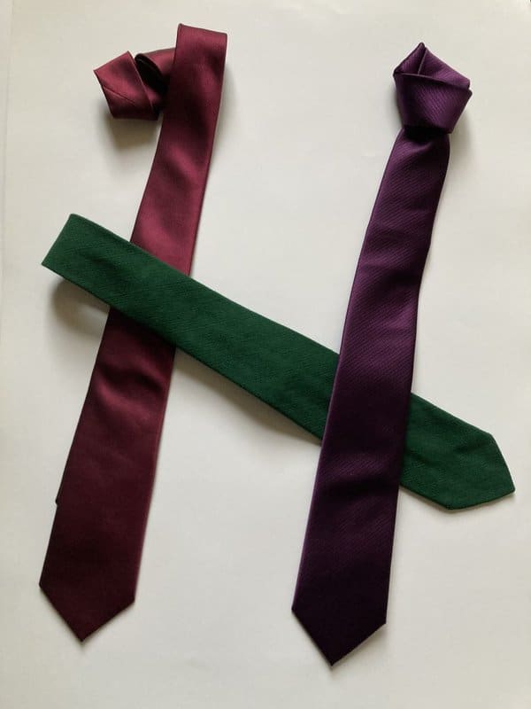 Dark green, burgundy, and purple tie