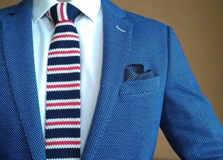 blue blazer paired with a classic white shirt