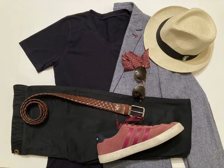 Black plain t-shirt, black jeans, hat, sunglasses with blue blazer