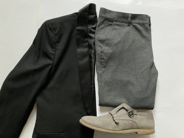 Black blazer with gray pant 