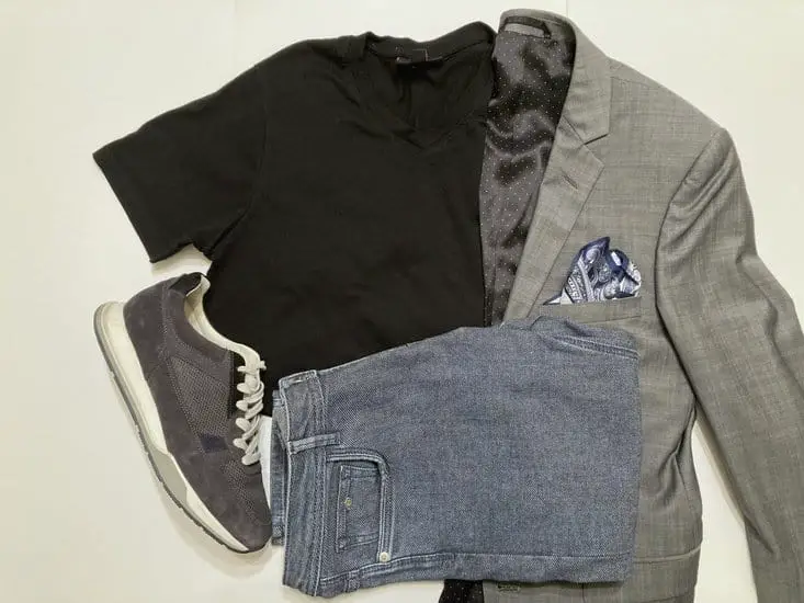 gray blazer with a plain black t-shirt and sneakers