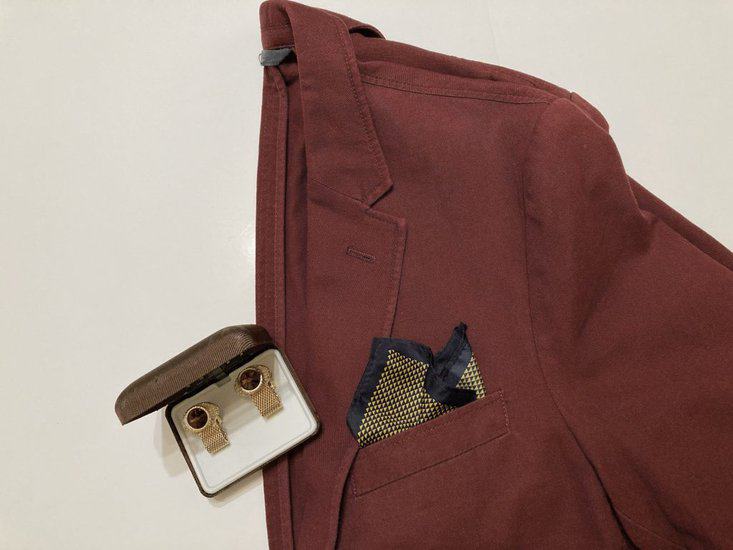 Gold cufflinks for a maroon blazer